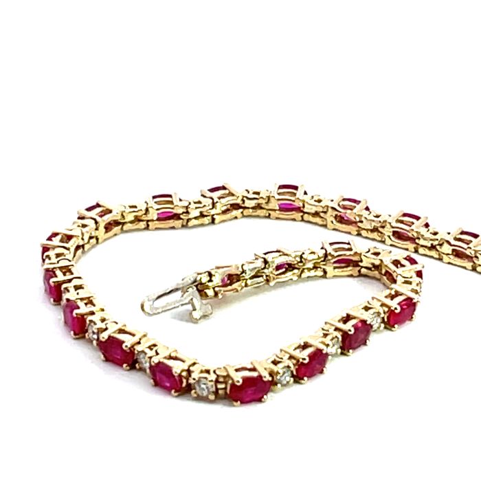 14K Yellow Gold Bracelet with 1.10ctw Diamonds and 6.80ctw Rubies 14K Yellow Gold Bracelet with 1.10ctw Diamonds and 6.80ctw Rubies