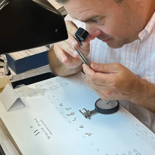 GIA-trained diamond buyers at White Pine Diamonds evaluating diamonds and jewelry